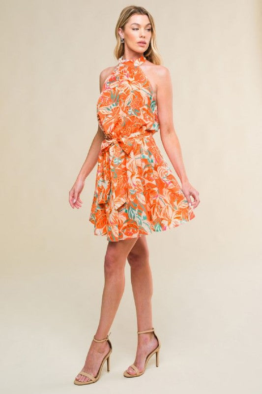 Printed woven mini dress featuring halter neckline