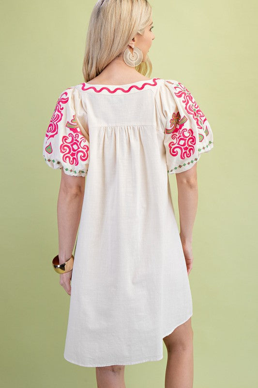 Embroidered pleated dress